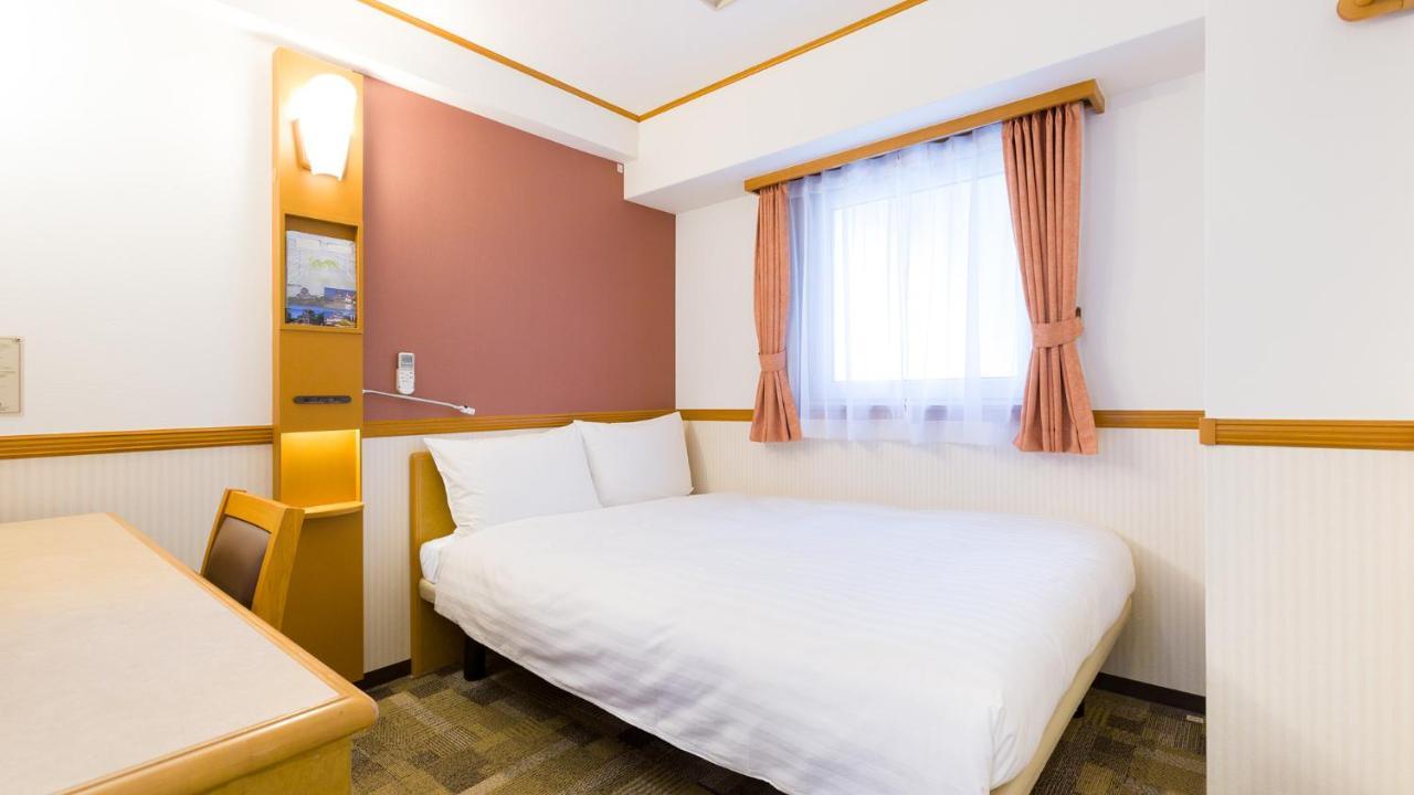 Toyoko Inn Tokyo Shinagawa-Eki Takanawa-Guchi Bagian luar foto