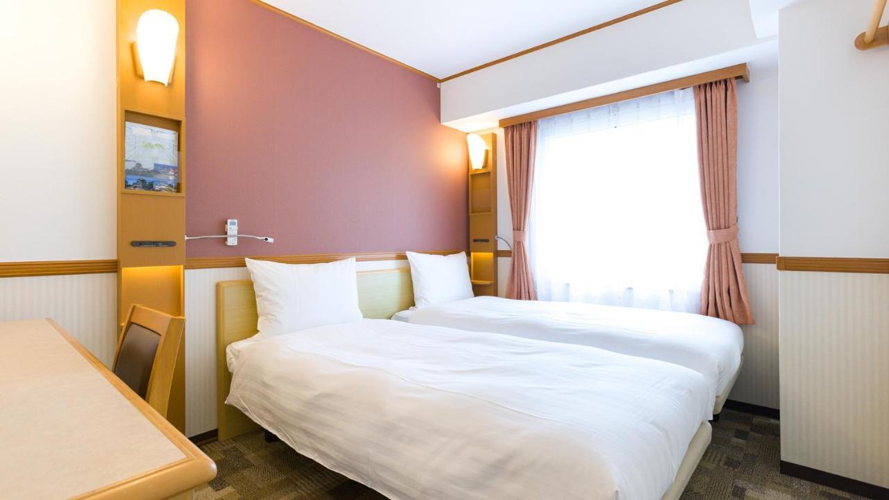 Toyoko Inn Tokyo Shinagawa-Eki Takanawa-Guchi Bagian luar foto