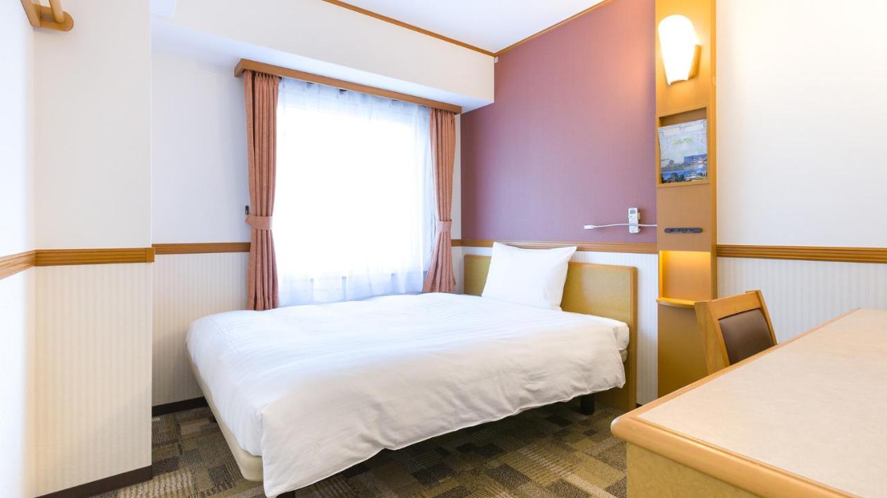 Toyoko Inn Tokyo Shinagawa-Eki Takanawa-Guchi Bagian luar foto