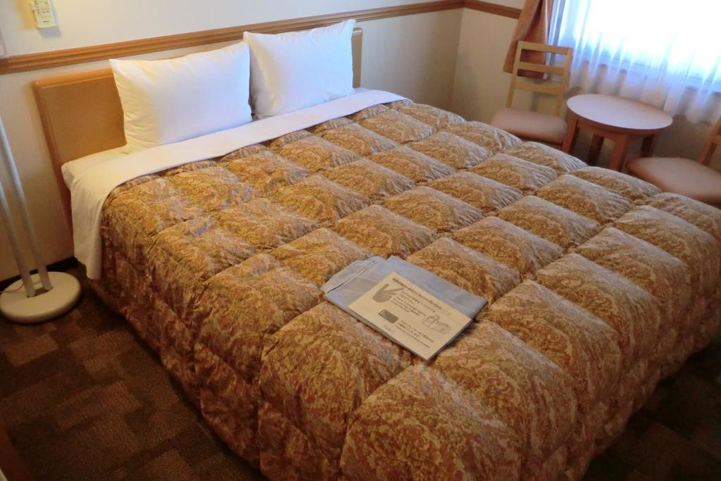 Toyoko Inn Tokyo Shinagawa-Eki Takanawa-Guchi Bagian luar foto
