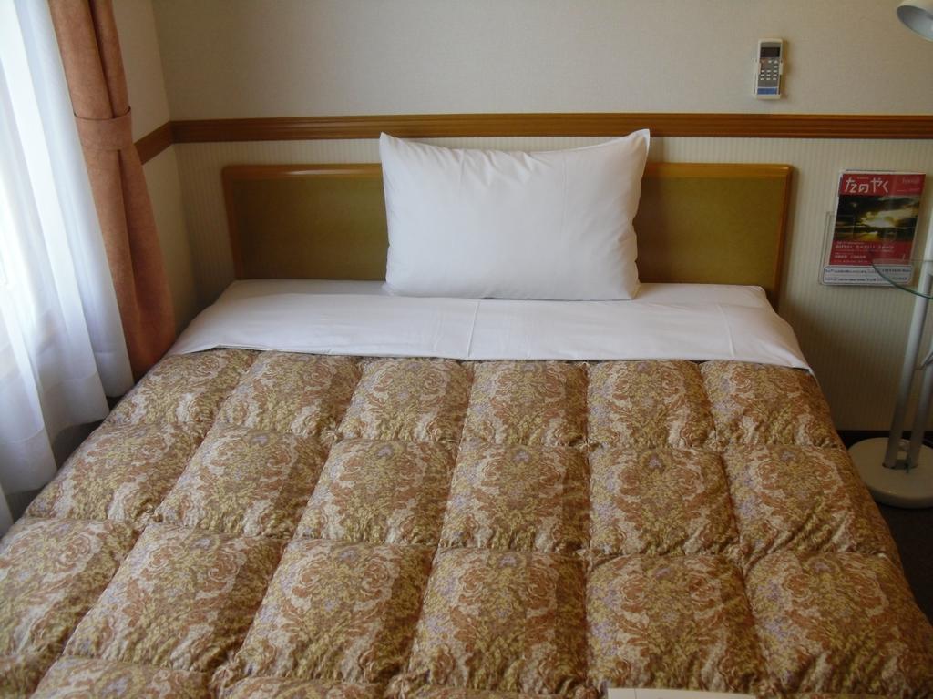 Toyoko Inn Tokyo Shinagawa-Eki Takanawa-Guchi Bagian luar foto